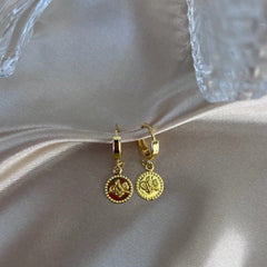 Reşat Baskı gold earrings